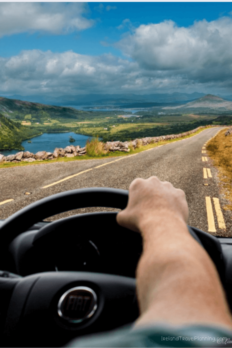 Driving through scenic Irish landscape, a key Ireland travel tip.