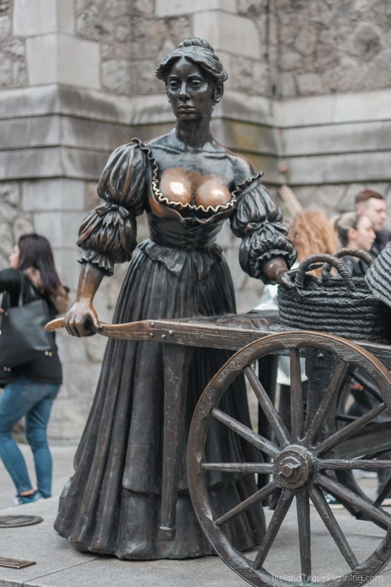 Dublin statue of a woman with a cart, one of many free things to do in Dublin.