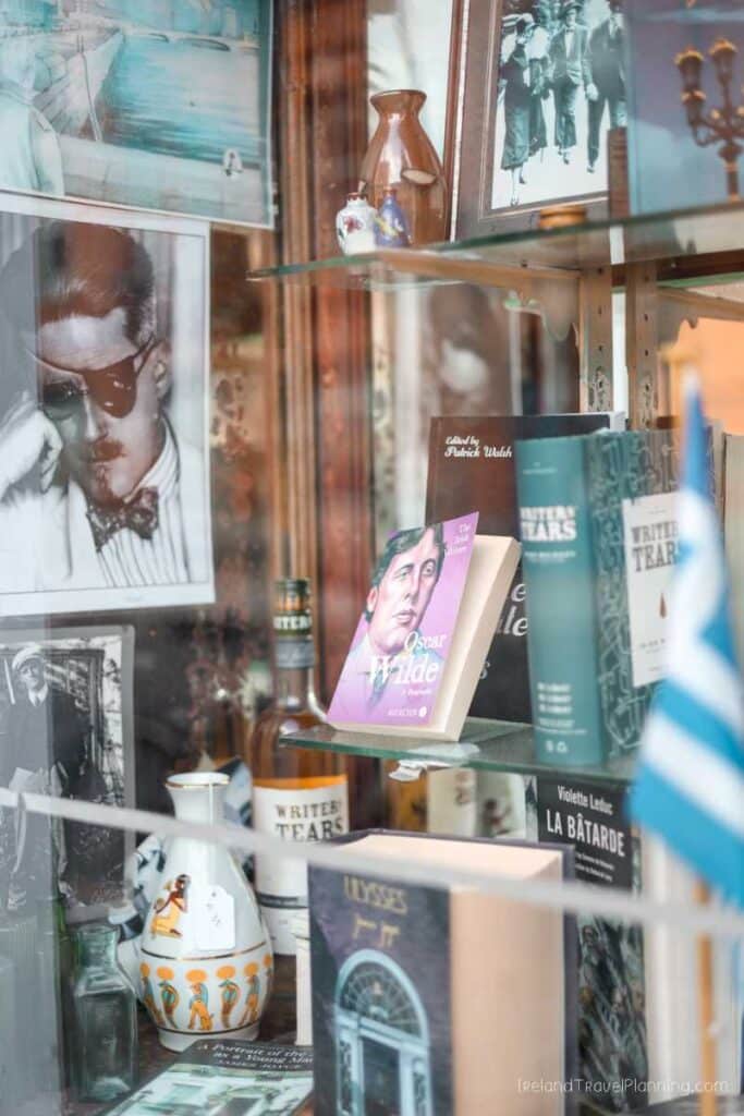 Dublin bookshop window display featuring Oscar Wilde and Ulysses books.