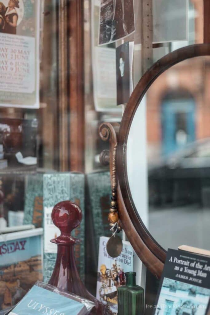 Dublin bookstore window display with James Joyce's "Ulysses" and "A Portrait of the Artist as a Young Man.