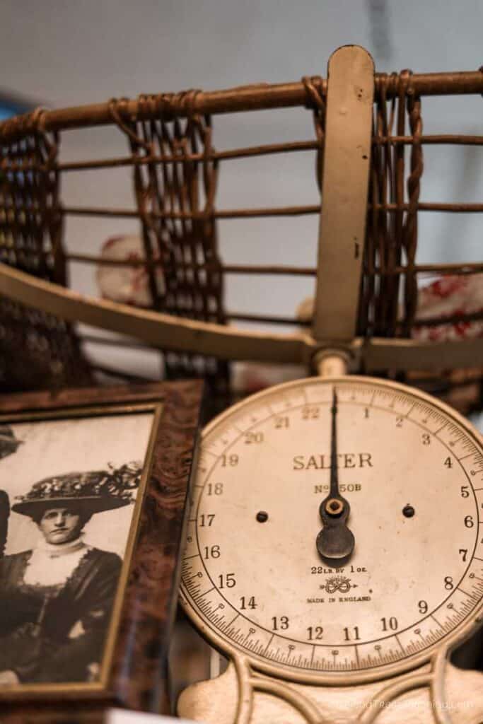 Vintage Salter scale with basket and old photo, a free thing to do in Dublin museums.
