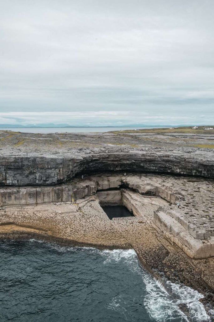 The Worm Hole, a natural pool on Inis Mór. Things to do on Inis Mór include seeing this unique landmark.