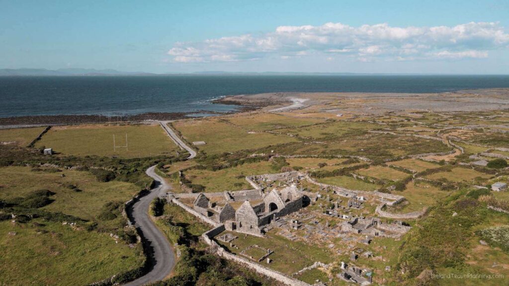 Inis Mór: Aerial view of ruins and coastal landscape.