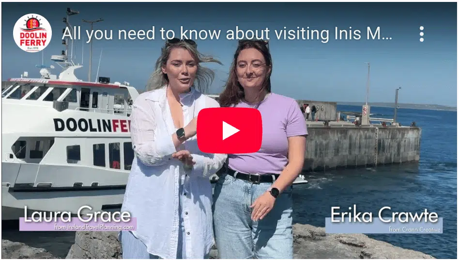 Visiting Inis Mór: Two women stand in front of a Doolin Ferry.