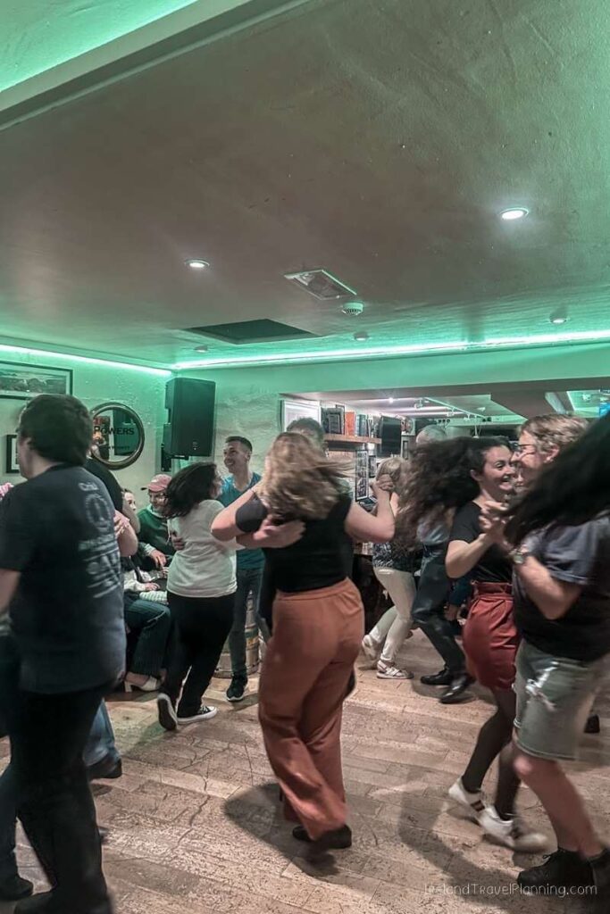 People dancing Irish music at a pub in Kerry.