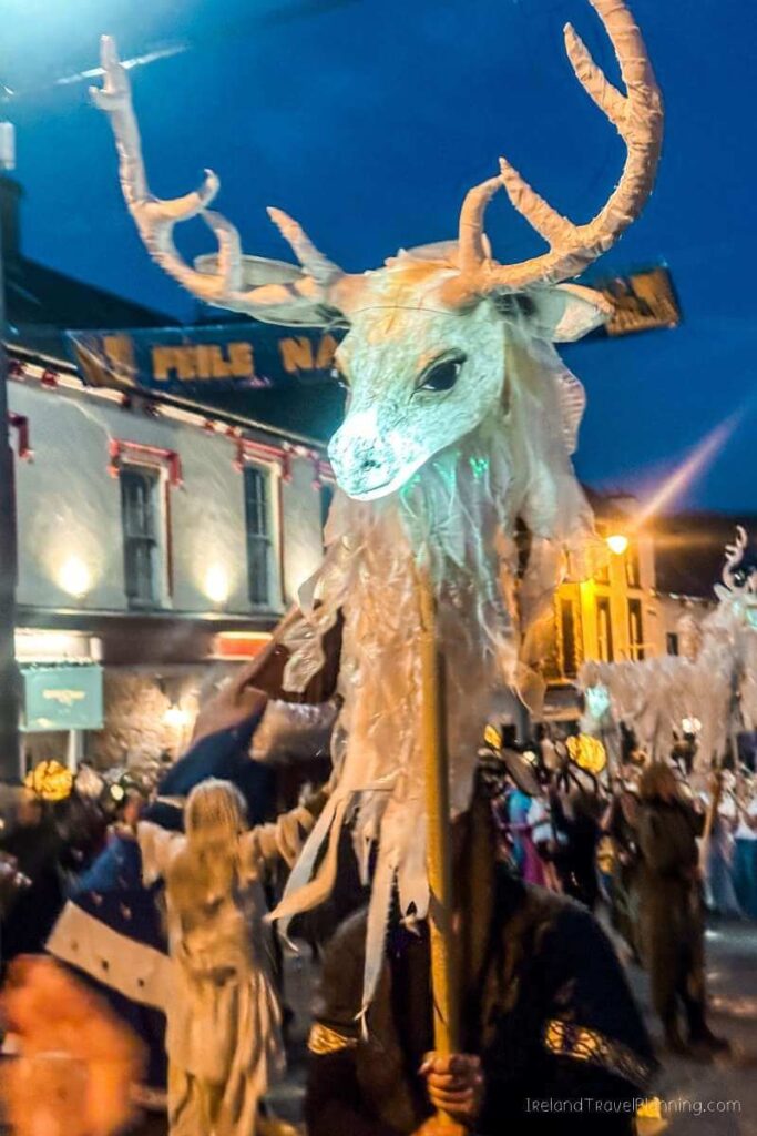 Large deer puppet in Kerry parade, part of "things to do in Kerry".