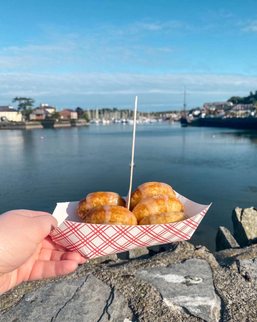 A Tray of Donuts looking out at the coastal views in a town in Ireland Kinsale