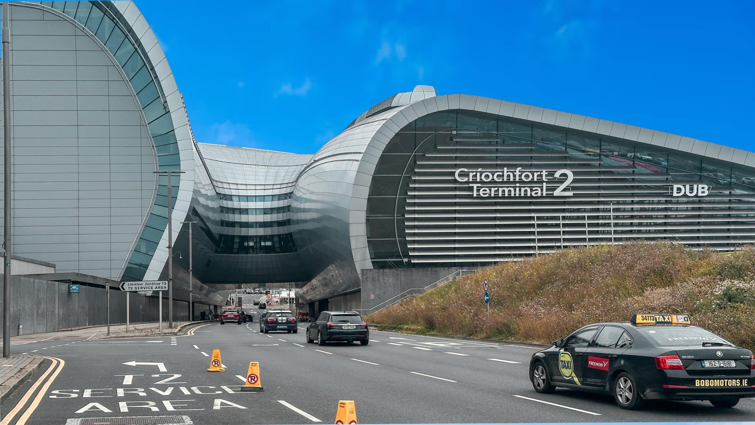 Dublin Airport Terminal 2 (DUB) showing Criochfort Terminal 2 with cars and taxis.