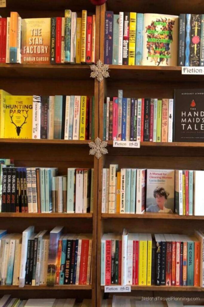 Bookshelves filled with fiction books in Dublin, a hidden gem for book lovers.