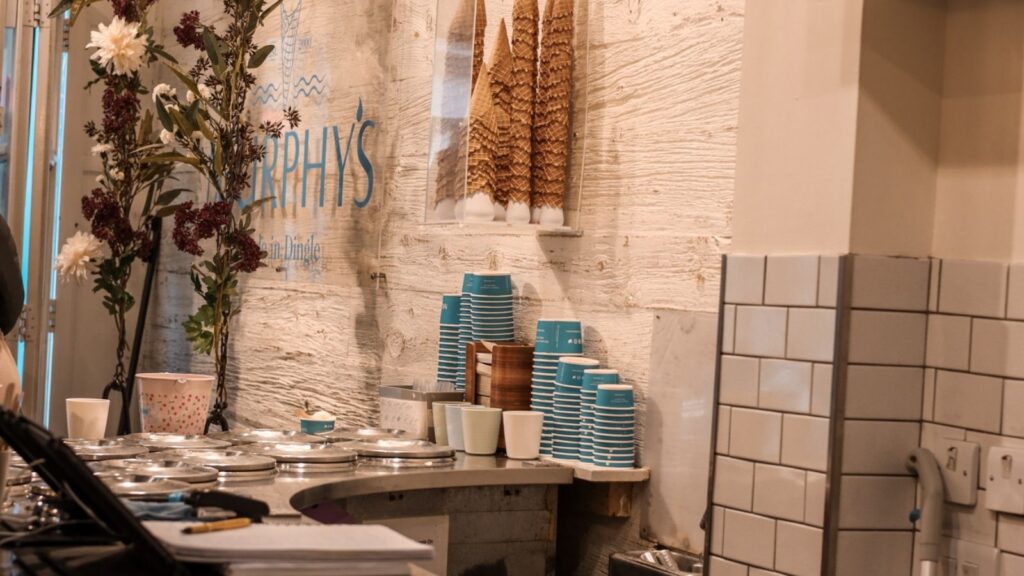 Murphy's Ice Cream shop interior in Dublin. Locally made ice cream, cones, and cups on display.
