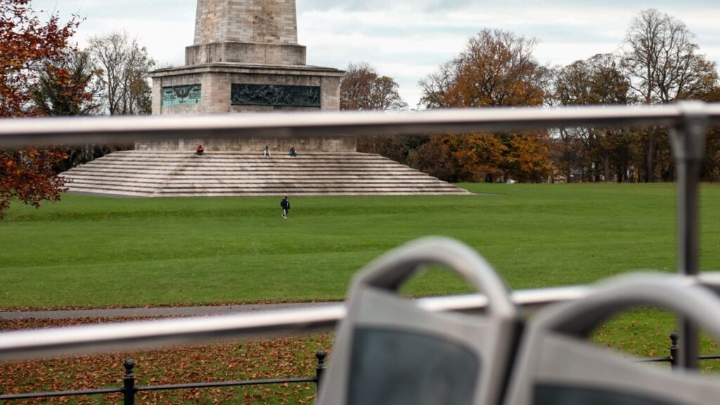 Phoenix Monument in Dublin's Phoenix Park, seen from a bus.