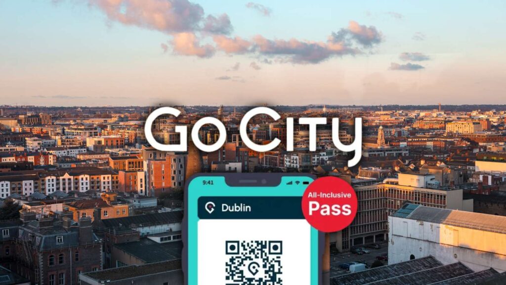 Dublin Go City All-Inclusive Pass on a phone, with a Dublin cityscape.