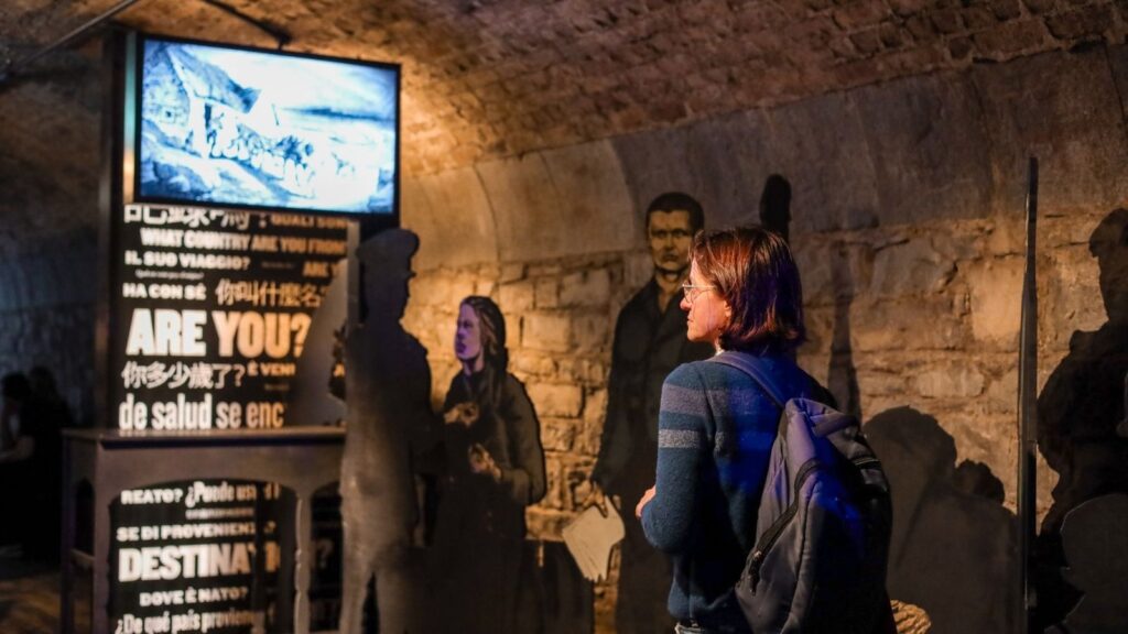 Dublin visitor at exhibit with questions in many languages: "Are You?