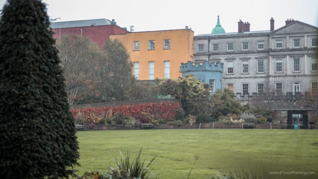 Dublin city park scene with colorful buildings in the background. Ireland travel.