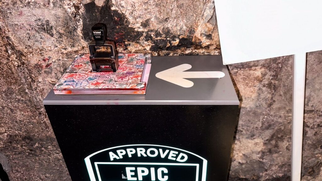 Passport stamp station with "Approved Epic" sign, likely for Dublin Pass holders.