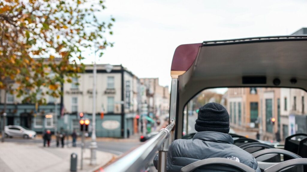 Riding a Dublin tour bus, viewing city buildings. Dublin Pass blog content.