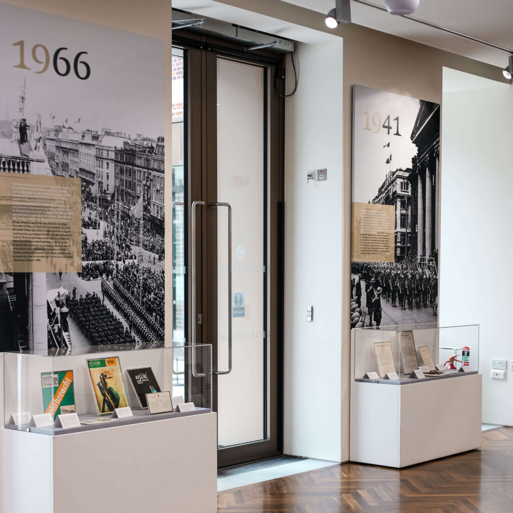 Dublin museum exhibit featuring historical photos from 1941 and 1966, showcasing Dublin's past.