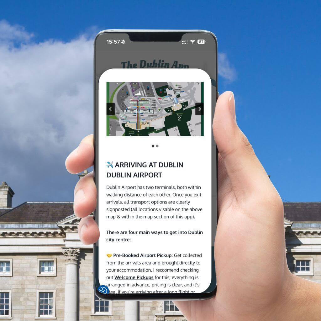 Hand holding phone displaying Dublin Airport arrival information