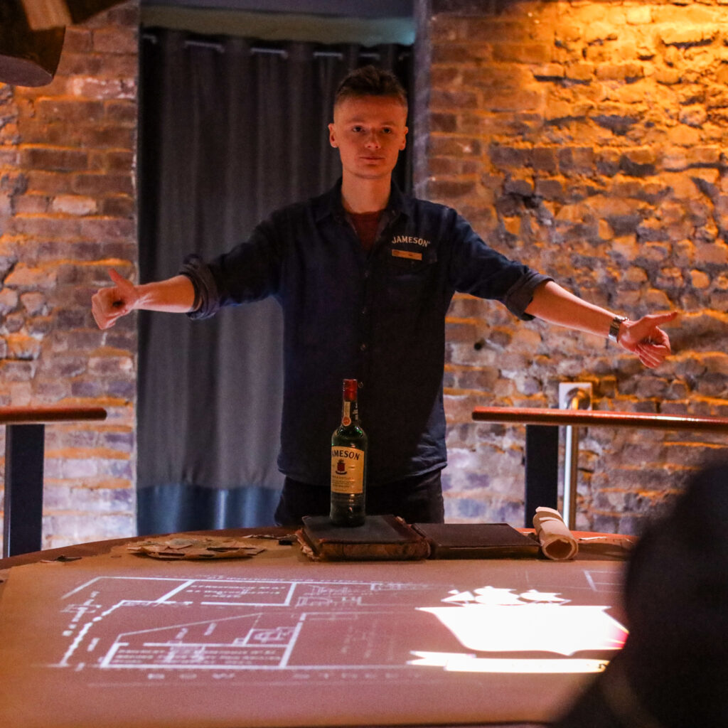 Bartender presents Jameson Irish Whiskey during tours & experiences.