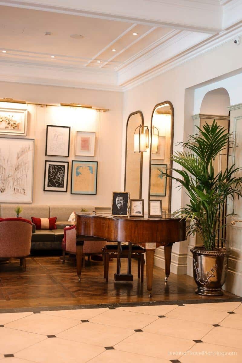 Grand piano and elegant decor in a Cork City hotel lobby