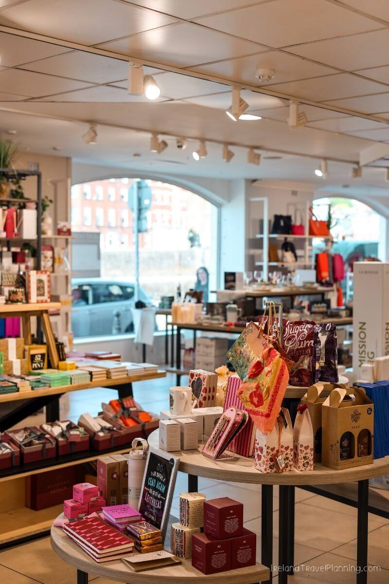 Boutique shop in Cork City with various gift items and books on tables