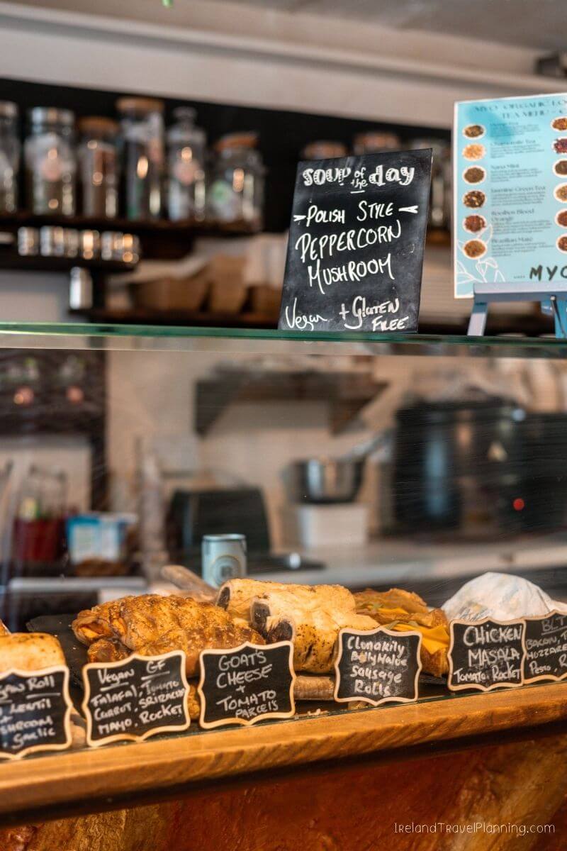 Vegan and gluten-free baked goods on a glass counter in Cork City