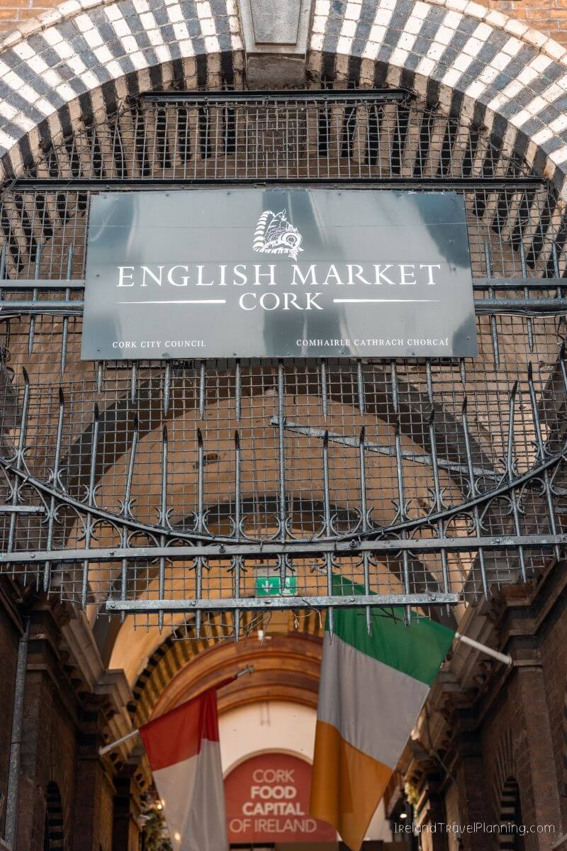 English Market Cork sign with Irish flags below