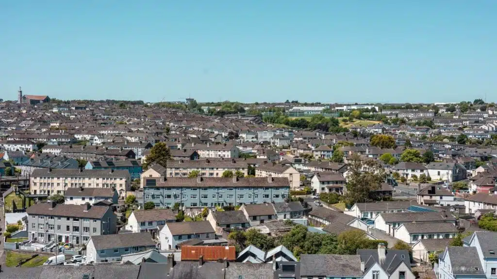 Aerial view of Cork City with many residential buildings and trees