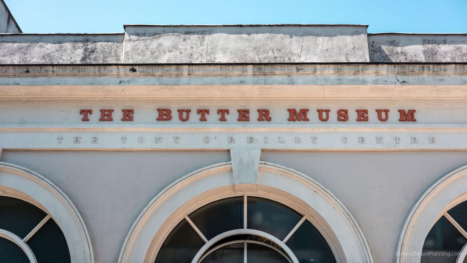 The Butter Museum in Cork City with arched windows and red signage
