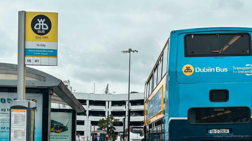 Dublin Bus stop 7347 with a blue double-decker bus, route to Dublin Airport.