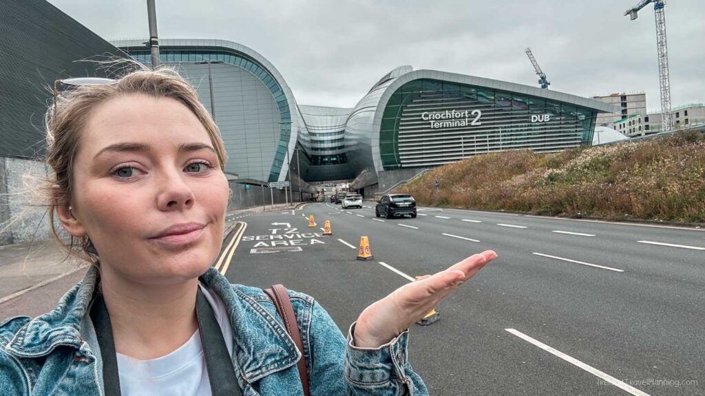 Woman in denim jacket at Dublin Airport Terminal 2, Ireland