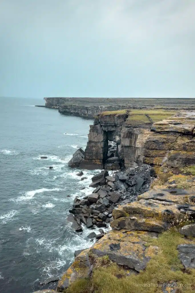 Dramatic sea cliffs and ocean waves at Aran Islands, Ireland