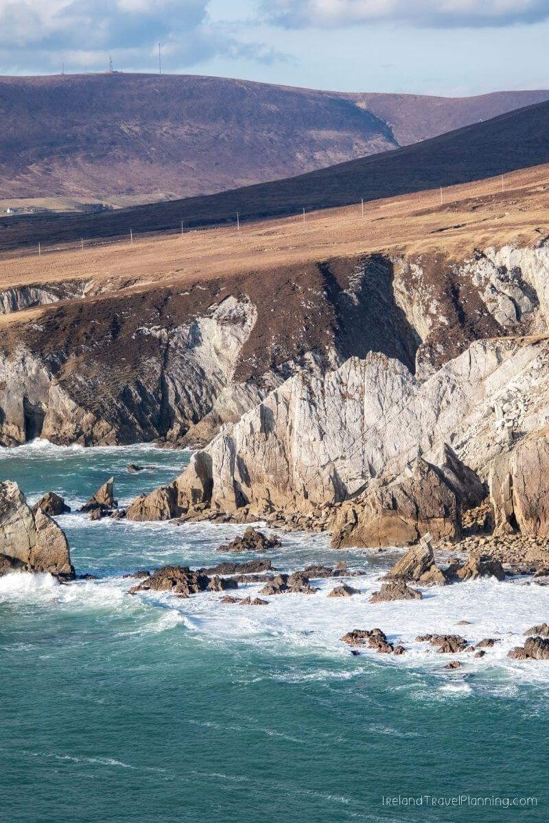 Dramatic Irish coast with rocky cliffs and choppy sea