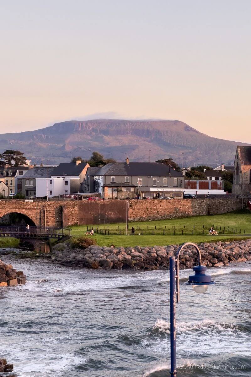 Sligo town harbor at sunset with Benbulben mountain in the background