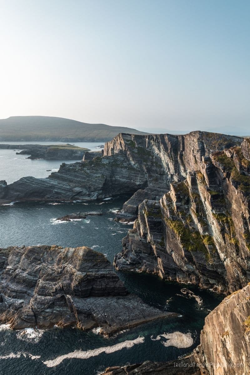 Dramatic cliffs and sea stacks on the coast of Ireland, a hidden gem.