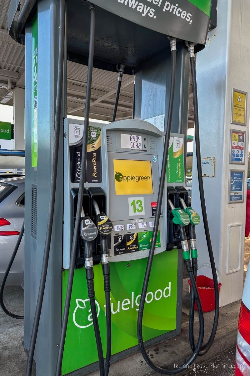 Applegreen petrol station in Ireland with fuel pumps and car