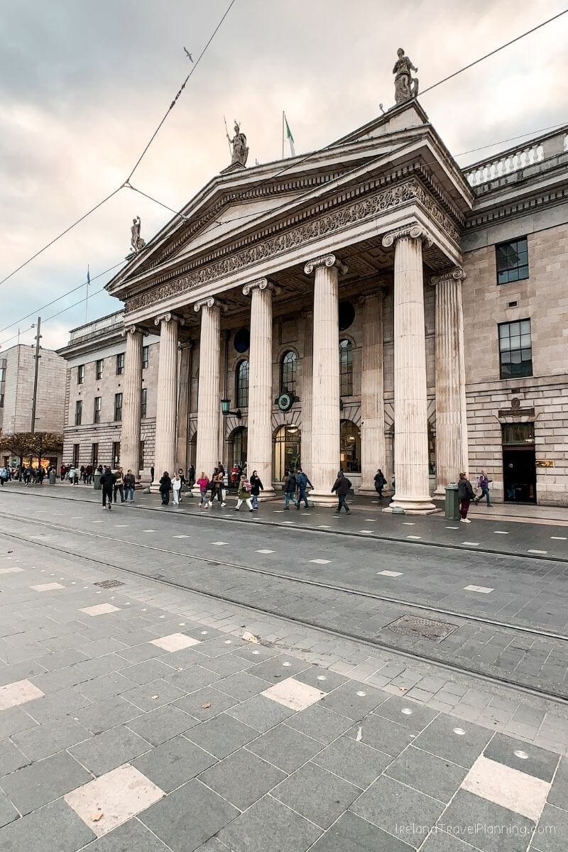 GPO building, Dublin, Ireland: grand neoclassical facade with columns and people.