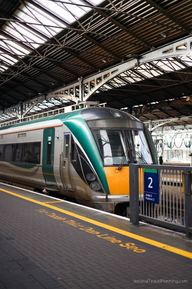 Irish Rail train at platform 2, part of an Ireland trip cost discussion.