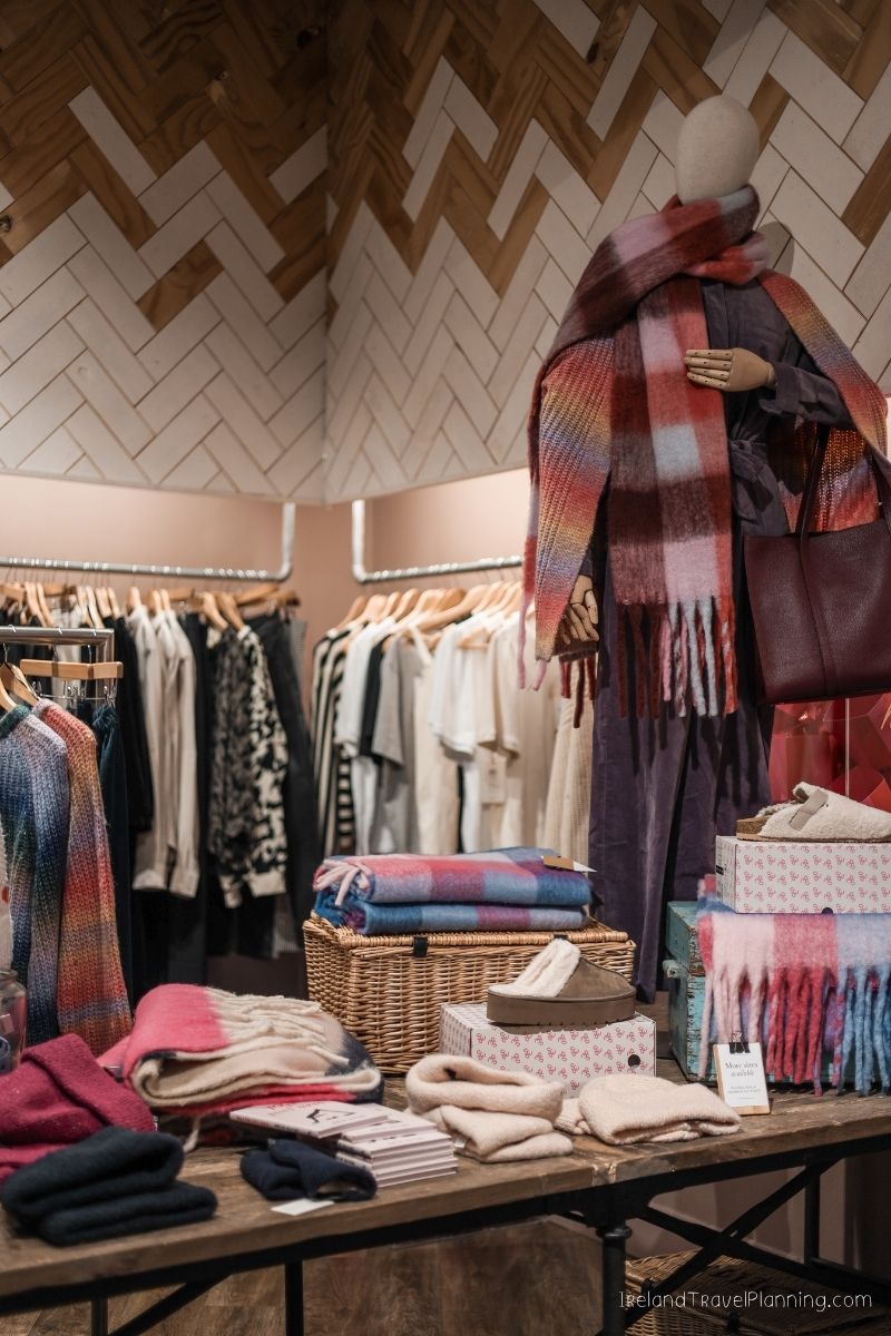Cozy scarves and blankets in a boutique, Ireland travel shopping