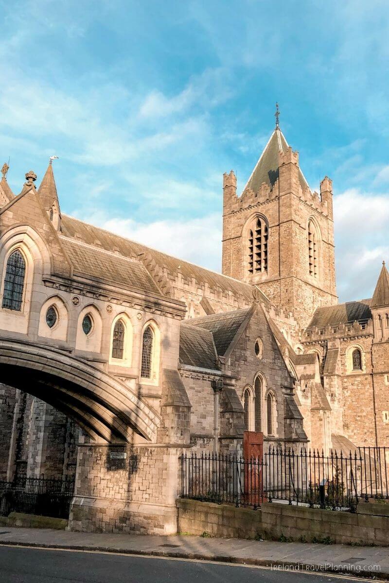 Christ Church Cathedral Dublin, an ancient Gothic cathedral with a stone bridge.