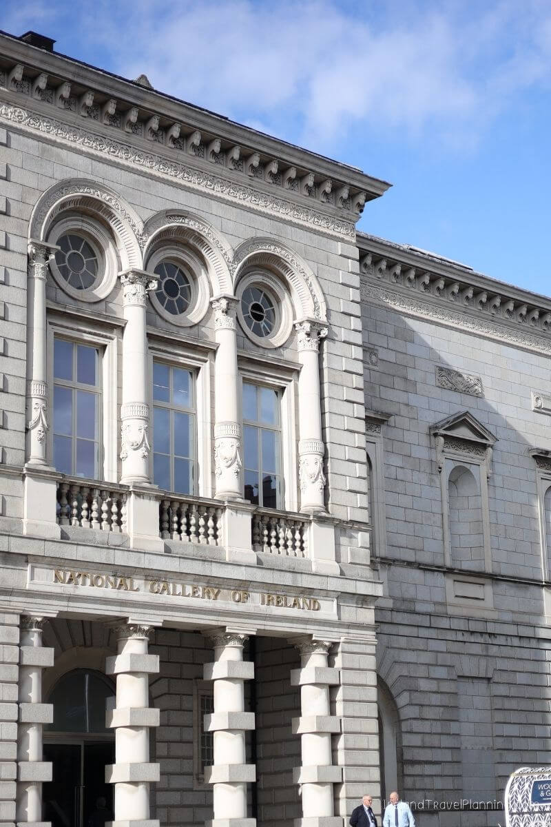 National Gallery of Ireland building facade with ornate classical architecture and arched windows.
