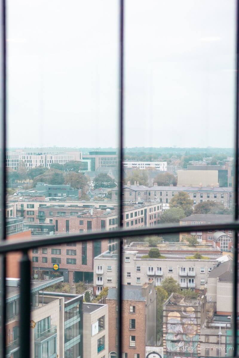 Aerial view of Dublin city rooftops, showcasing diverse architecture and urban landscape.