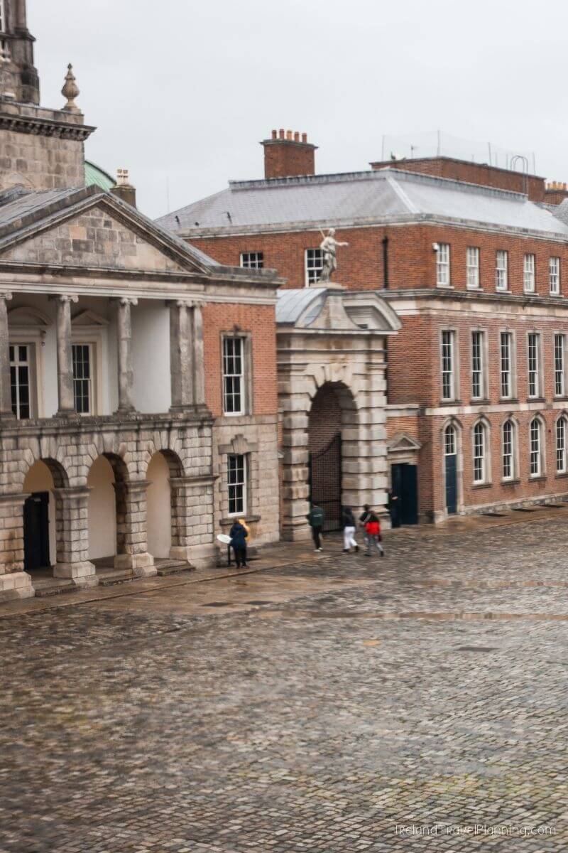 Dublin Castle courtyard with cobblestones and historic buildings